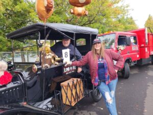 Teddy Bear Parade Gresham. Image of Owners of Junk-N-Joe with Model T Ford in Parade.